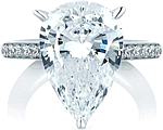 This image shows the setting with a 5.00ct pear shape center diamond. The setting can be ordered to accommodate any shape/size diamond listed in the setting details section below.
