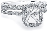 This image shows the setting with an empty basket meant for a cushion cut center diamond. The setting can be ordered to accommodate any shape/size diamond listed in the setting details section below.