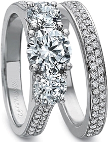 DescriptionThis image shows the setting with a 1ct round center diamond. The setting can be ordered to accommodate any shape/size diamond listed in the setting details section below. The matching wedding band is sold separately. 