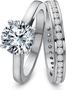 This image shows the setting with a 2ct round center diamond. The setting can be ordered to accommodate any shape/size diamond listed in the setting details section below. The matching wedding band is sold separately. 