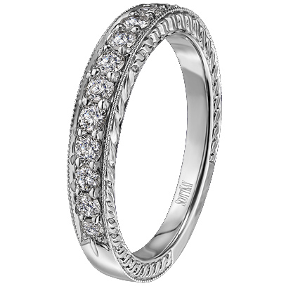 This Vintage wedding band by Scott Kay is paveset with round brilliand 