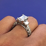 This image shows the setting with a 1.50ct emerald cut center diamond.