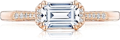This image shows the setting with a .85ct emerald cut center diamond. The setting can be ordered to accommodate any shape/size diamond listed in the setting details section below.