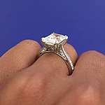 This image shows the setting with a 3.00ct emerald cut center diamond. The setting can be ordered to accommodate any shape/size diamond listed in the setting details section below.