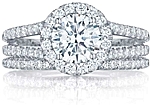 This image shows the setting with a 1.00ct round brilliant cut center diamond. The setting can be ordered to accomodate any shape/size diamond listed in the setting details section below. Shown with the matching wedding band; Sold separately.