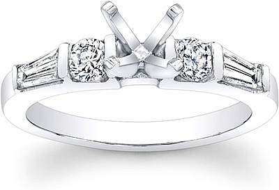Round cut diamond ring with tapered baguettes