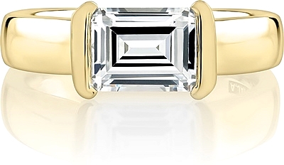This image shows the setting with a 1.50ct emerald cut center diamond. The setting can be ordered to accommodate any shape/size diamond listed in the setting details section below.

