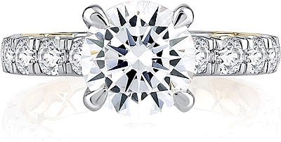 This image shows the setting with a 1.25ct round brilliant cut center diamond. The setting can be ordered to accommodate any shape/size diamond listed in the setting details section below.
