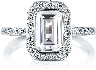 This image shows the setting with a 2.00ct emerald cut center diamond. The setting can be ordered to accommodate any shape/size diamond listed in the setting details section below.
