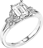 This image shows the setting with a 1.00ct emerald cut center diamond. The setting can be ordered to accommodate any shape/size diamond listed in the setting details section below.
