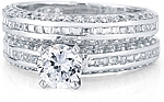 This image shows the setting with a 1.00ct round brilliant cut center diamond and the matching wedding band; sold separately.