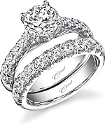 This image shows the setting with a 1.25ct round brilliant cut center diamond. The setting can be ordered to accommodate any shape/size diamond listed in the setting details section below. Wedding band sold separately.