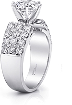 This image shows the setting with a 2.00ct round brilliant cut center diamond. The setting can be ordered to accommodate any shape/size diamond listed in the setting details section below. Wedding band sold separately.
