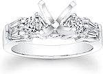 This image shows the setting made to hold a 1.00ct round brilliant cut center diamond. The setting can be ordered to accommodate any shape/size diamond listed in the setting details section below. 
