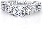 This image shows the setting with a 1.00ct round brilliant cut center diamond and the matching wedding band; sold separately.