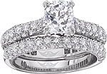 This image shows the setting with a 1.50ct cushion cut center diamond. The setting can be ordered to accommodate any shape/size diamond listed in the setting details section below. The matching wedding band is sold separately.
