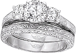 This image shows the setting with a 1.00ct round brilliant cut center diamond. The setting can be ordered to accommodate any shape/size diamond listed in the setting details section below. The matching wedding band is sold separately.