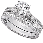 This image shows the setting with a 1.25ct round brilliant cut center diamond. The setting can be ordered to accommodate any shape/size diamond listed in the setting details section below. The matching wedding band is sold separately.