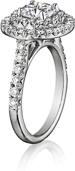 This image shows the setting with a .70ct round brilliant cut center diamond. The setting can be ordered to accommodate any shape/size diamond listed in the setting details section below.