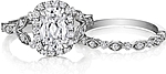 This image shows the setting with a 1.25ct cushion cut center diamond. The setting can be ordered to accommodate any shape/size diamond listed in the setting details section below. Shown with the matching wedding band; Sold separately.