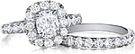 This image shows the setting with a 1.00ct cushion cut center diamond. The setting can be ordered to accommodate any shape/size diamond listed in the setting details section below. Shown with the matching wedding band; Sold separately.