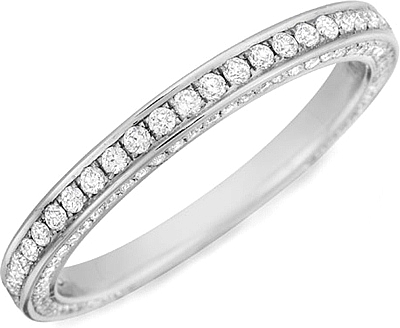 This image shows the wedding band with .58ct round brilliant cut pave set diamonds by Henri Daussi.