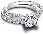 This image shows the setting with a 1.00ct round brilliant cut center diamond. The setting can be ordered to accommodate any shape/size diamond listed in the setting details section below. Shown with the matching wedding band; Sold separately.
