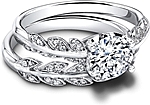 This image shows the setting with a 1.00ct round brilliant cut center diamond. The setting can be ordered to accommodate any shape/size diamond listed in the setting details section below. Shown with the matching wedding band; Sold separately.