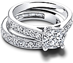 This image shows the setting with a 1.00ct cushion cut center diamond. The setting can be ordered to accommodate any shape/size diamond listed in the setting details section below. Shown with the matching wedding band; Sold separately. 
