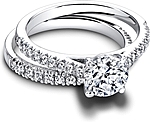 This image shows the setting with a 1.00ct round brilliant cut center diamond. The setting can be ordered to accommodate any shape/size diamond listed in the setting details section below. Shown with the matching wedding band; Sold separately.
