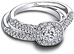 This image shows the setting with a .75ct round brilliant cut center diamond. The setting can be ordered to accommodate any shape/size diamond listed in the setting details section below. Shown with the matching wedding band; Sold separately.
