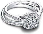 This image shows the setting with a .75ct round brilliant cut center diamond. The setting can be ordered to accommodate any shape/size diamond listed in the setting details section below. Shown with the matching wedding; Sold separately.
