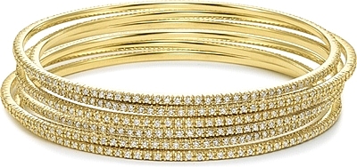 This picture shows six 14k yellow gold diamond bangles; Each sold separately.