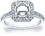 This image shows the setting with a basket made to hold a 1.25ct round brilliant cut center diamond. The setting can be ordered to accommodate any shape/size diamond listed in the setting details section below.