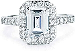 This image shows the setting with a 1.00ct emerald cut center diamond. The setting can be ordered to accommodate any shape/size diamond listed in the setting details section below.
