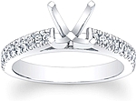 This image shows the setting made to hold a 1.00ct round brilliant cut center diamond. The setting can be ordered to accommodate any shape/size diamond listed in the setting details section below.
