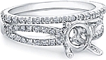 This image shows the setting with a basket made to hold a 1.00ct round brilliant cut center diamond. The setting can be ordered to accommodate any shape/size diamond listed in the setting details section below. (shown with matching wedding band- sold separately)