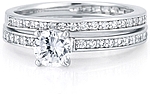 This image shows the setting with a 1.00ct round brilliant cut center diamond and the matching wedding band; sold separately.