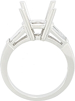 This image shows the setting with a basket made for 1.00ct round brilliant cut diamond. The setting can be ordered to accomodate any size/shape diamond listed on the setting details section below. 