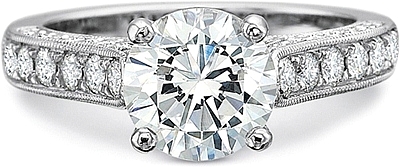 This image shows the setting with a 1.00ct round brilliant cut center diamond. The setting can be ordered to accommodate any shape/size diamond listed in the setting details section below. 