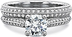 This image shows the setting with a 1.00ct round brilliant cut center diamond. The setting can be ordered to accommodate any shape/size diamond listed in the setting details section below. Shown with the matching wedding band; Sold separately.