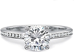 This image shows the setting with a .75ct round brilliant cut center diamond. The setting can be ordered to accommodate any shape/size diamond listed in the setting details section below.