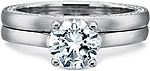 This image shows the setting with a 1.00ct round brilliant cut center diamond. The setting can be ordered to accommodate any shape/size diamond listed in the setting details section below. Shown with the matching wedding band; Sold separately.