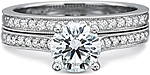 This image shows the setting with a 1.00ct round brilliant cut center diamond. The setting can be ordered to accommodate any shape/size diamond listed in the setting details section below. Shown with the matching wedding band; Sold separately.