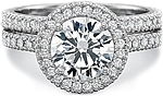 This image shows the setting with a 1.50ct round brilliant cut center diamond. The setting can be ordered to accommodate any shape/size diamond listed in the setting details section below. Shown with the matching wedding band; Sold separately.