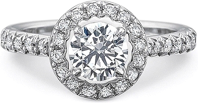 This image shows the setting with a .75ct round brilliant cut center diamond. The setting can be ordered to accommodate any shape/size diamond listed in the setting details section below.