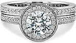 This image shows the setting with a 1.00ct round brilliant cut center diamond. The setting can be ordered to accommodate any shape/size diamond listed in the setting details section below. Shown with the matching wedding band; Sold separately.