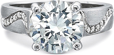 This image shows the setting with a 1.00ct round brilliant cut center diamond. The setting can be ordered to accommodate any shape/size diamond listed in the setting details section below.
