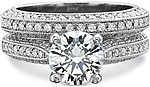 This image shows the setting with a 1.00ct round brilliant cut center diamond. The setting can be ordered to accommodate any shape/size diamond listed in the setting details section below. Shown with the matching wedding band; Sold separately.