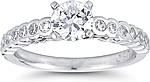 This image shows the setting with a 1.00ct round brilliant cut center diamond. The setting can be ordered to accomodate any shape/size diamond listed in the setting details section below.